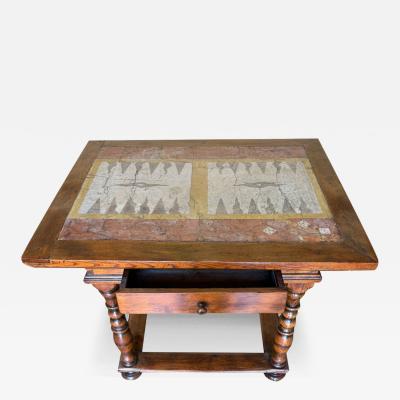 A 19th Century marvelous Tuscan Walnut Games Table with stone games top