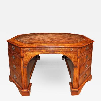 A 19th century English Walnut Octagonal Partners Desk