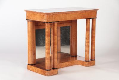 A 19th century figured elm console resting on four round Doric style columns