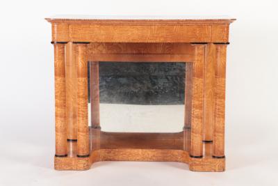 A 19th century figured elm console resting on four round Doric style columns