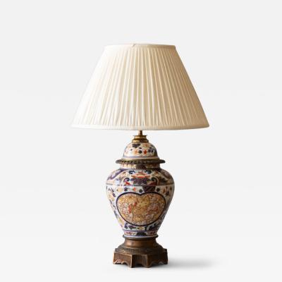 A BAYEUX PORCELAIN VASE WITH IMARI DECORATION CONVERTED TO A TABLE LAMP