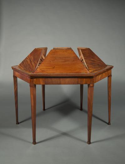 A BEAUTIFULLY PROPORTIONED MAHOGANY HEXAGONAL CENTER TABLE
