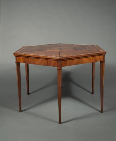 A BEAUTIFULLY PROPORTIONED MAHOGANY HEXAGONAL CENTER TABLE