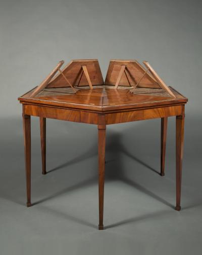 A BEAUTIFULLY PROPORTIONED MAHOGANY HEXAGONAL CENTER TABLE