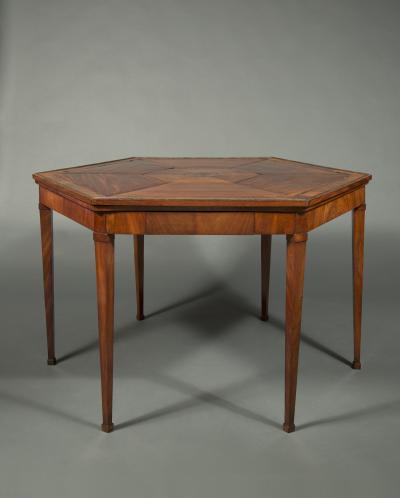 A BEAUTIFULLY PROPORTIONED MAHOGANY HEXAGONAL CENTER TABLE