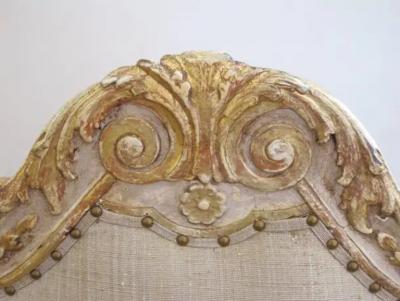 A Baronial French Regence Style Ivory Painted Open Armchair