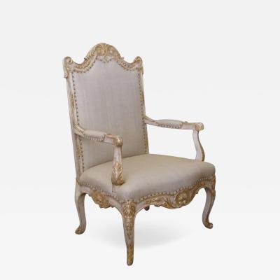 A Baronial French Regence Style Ivory Painted Open Armchair