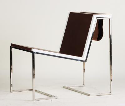 A Bauhaus minimal inspired leather and stainless steel chair contemporary