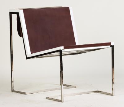 A Bauhaus minimal inspired leather and stainless steel chair contemporary