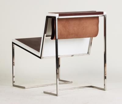 A Bauhaus minimal inspired leather and stainless steel chair contemporary
