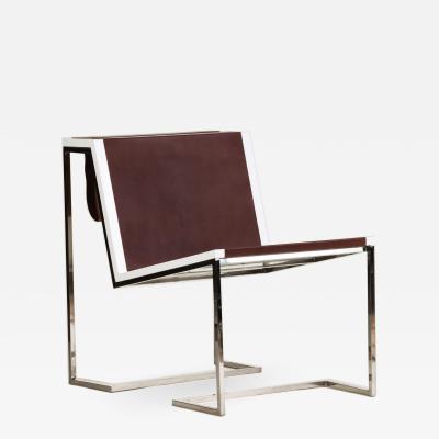 A Bauhaus minimal inspired leather and stainless steel chair contemporary