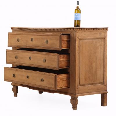 A Belgian Neoclassical style Three Drawer Oak Commode C 1860 