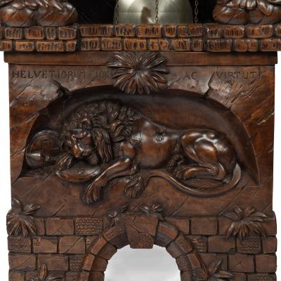A Black Forest linden wood long case clock by Spring of Interlaken