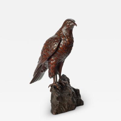 A Black Forest linden wood model of a hawk