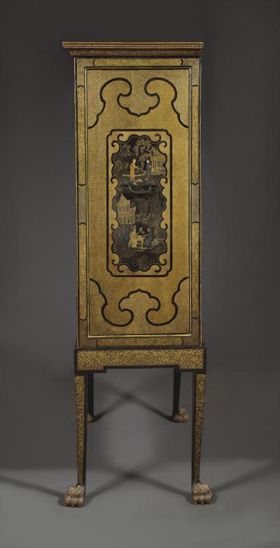 A Black Lacquer Polychrome And Two Color Gilt Cabinet On Original Stand