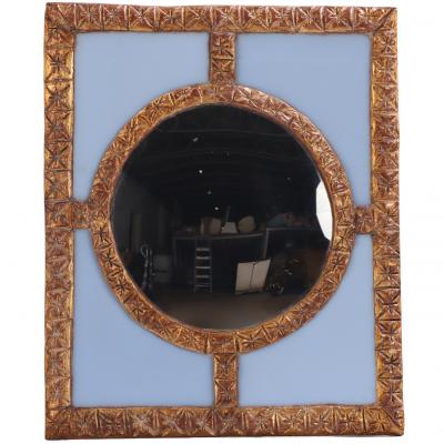 A Blue Glass and Resin Quadrant Wall Mirror 