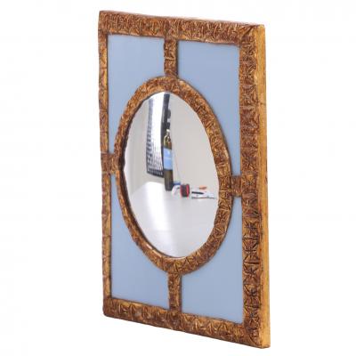 A Blue Glass and Resin Quadrant Wall Mirror 