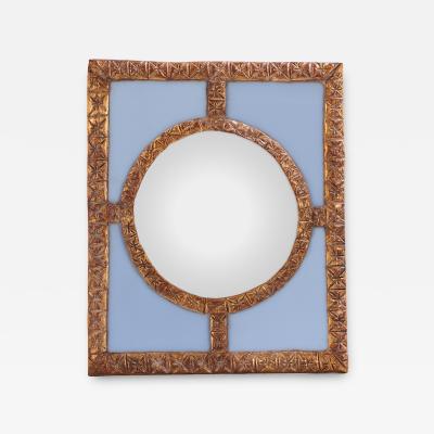 A Blue Glass and Resin Quadrant Wall Mirror 