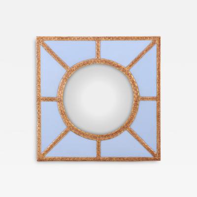 A Bold Geometric Blue Glass and Gold Resin Convex Wall Mirror