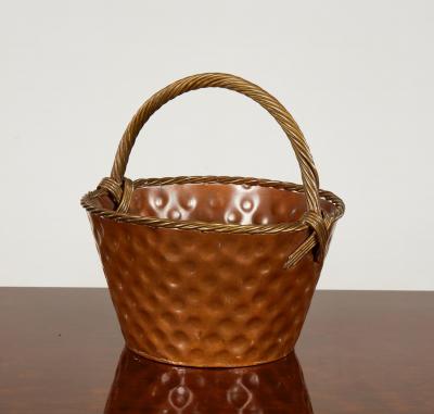 A Brass Loop Handled Dimpled Basket