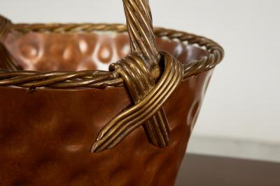 A Brass Loop Handled Dimpled Basket