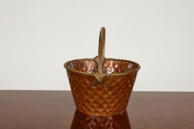 A Brass Loop Handled Dimpled Basket