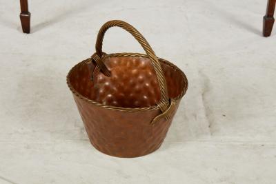 A Brass Loop Handled Dimpled Basket