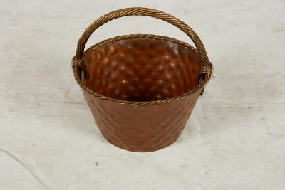 A Brass Loop Handled Dimpled Basket