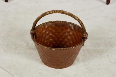 A Brass Loop Handled Dimpled Basket