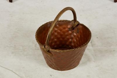 A Brass Loop Handled Dimpled Basket