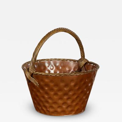 A Brass Loop Handled Dimpled Basket