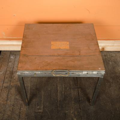 A British campaign style iron folding table or armchair Mid 19th C