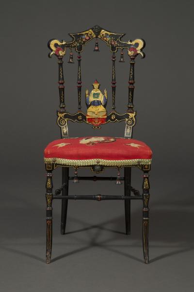 A CHARMING PAIR OF BLACK LACQUER AND POLYCHROME PAINTED CHINOISERIE SIDE CHAIRS