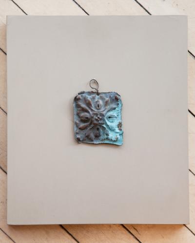 A COLLECTION OF SEVEN BRONZE MASTERS MOUNTED ON PAINTED WOODEN BLOCKS