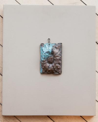 A COLLECTION OF SEVEN BRONZE MASTERS MOUNTED ON PAINTED WOODEN BLOCKS