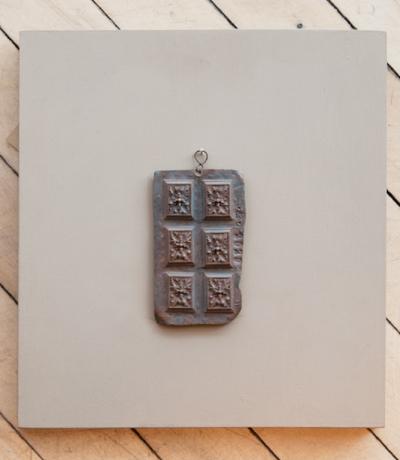 A COLLECTION OF SEVEN BRONZE MASTERS MOUNTED ON PAINTED WOODEN BLOCKS