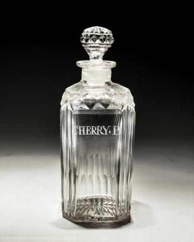 A CUT ENGRAVED LIQUEUR BOTTLE