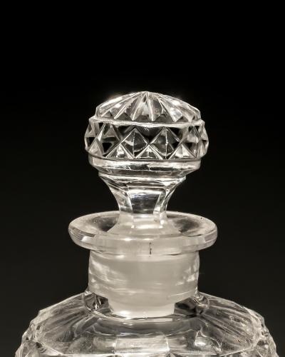 A CUT ENGRAVED LIQUEUR BOTTLE