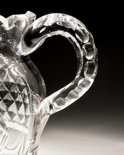 A CUT GLASS IRISH CREAM JUG
