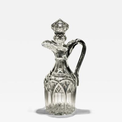 A CUT GLASS WILLIAM IV CLARET JUG