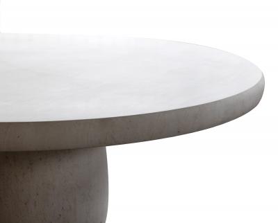 A Carved French Limestone Round Dining Center Table with Barrel form Base