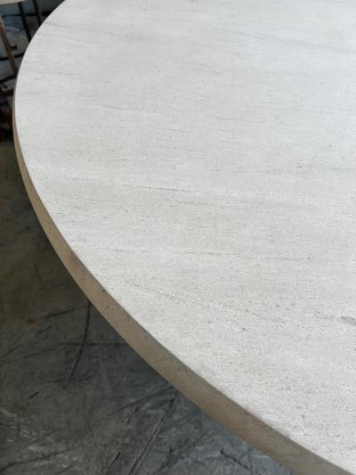 A Carved French Limestone Round Dining Center Table with Barrel form Base