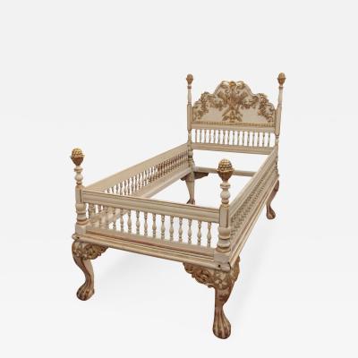 A Carved Painted and Gilded Wood Catalonian Bed