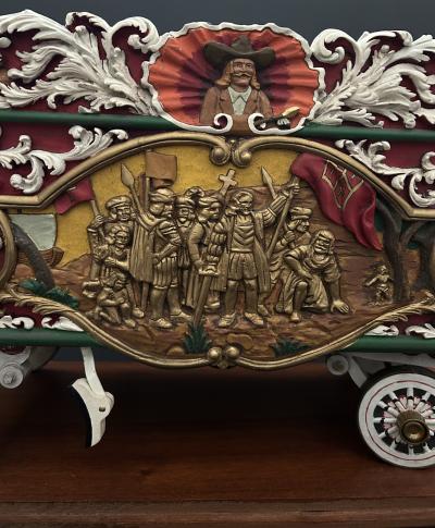 A Carved and Polychrome Paint Decorated Model of a Circus Wagon 