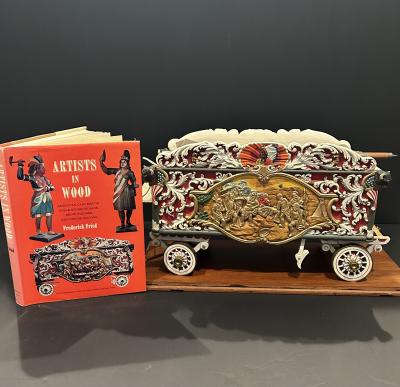 A Carved and Polychrome Paint Decorated Model of a Circus Wagon 