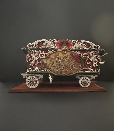 A Carved and Polychrome Paint Decorated Model of a Circus Wagon 