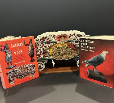 A Carved and Polychrome Paint Decorated Model of a Circus Wagon 