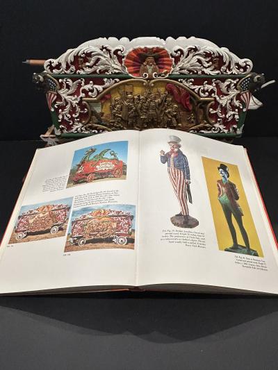 A Carved and Polychrome Paint Decorated Model of a Circus Wagon 