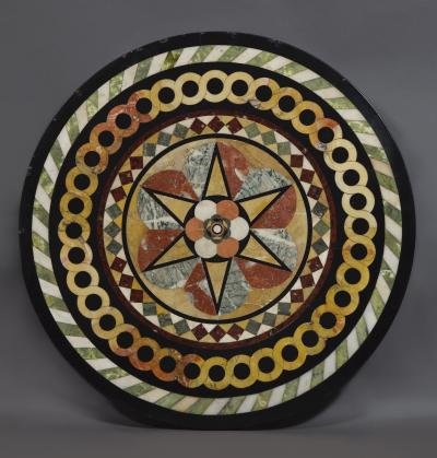 A Cast Iron Center Table With Specimen Marble Top Of Geometric Design