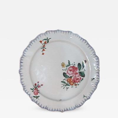 A Ceramic Plate with Painted Floral Decoration